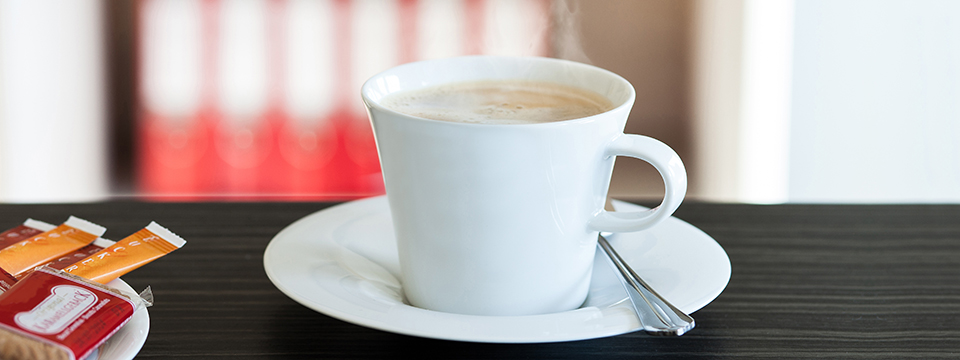 Kaffetasse und Kekse